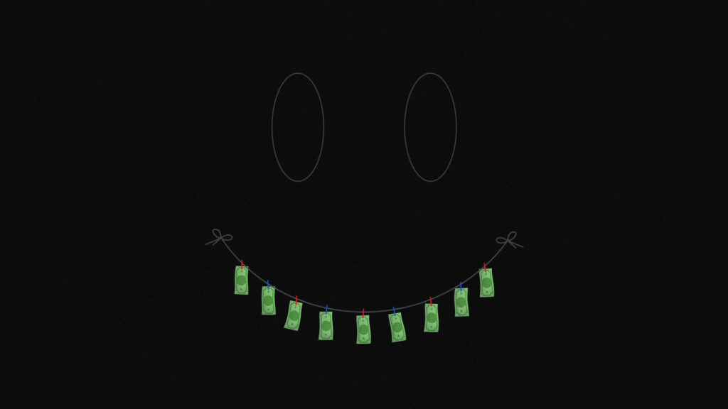 an image of smiley face with banknotes for teeth